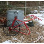 A galvanised steel water butt,