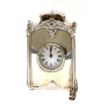 An Edwardian silver mounted mantel clock