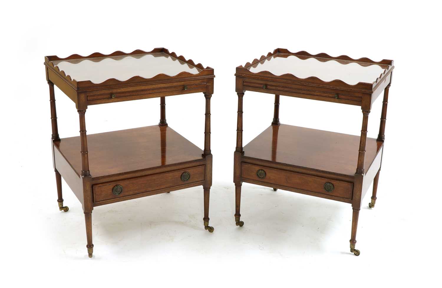 A pair of Regency style mahogany bedside tables,