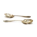 A pair of silver serving spoons,