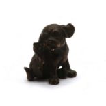 A Continental miniature bronze figure of a puppy,