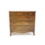 A Regency mahogany and boxwood strung chest of four graduated drawers,