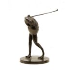A bronze of a frog playing golf,