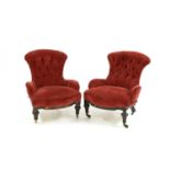 A pair of 19th century ebonised salon chairs,