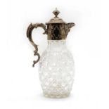 A Victorian cut glass and silver plated claret jug
