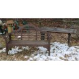 A teak topped garden table,