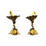 A pair of gilt bronze stands,