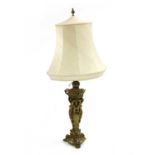 A large late Victorian gilt metal lamp,