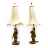 A pair of gilt metal and marble figural table lamps