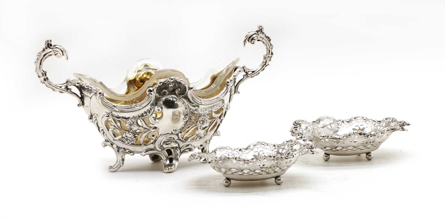 A Victorian silver and glass Rococo style dish,