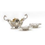 A Victorian silver and glass Rococo style dish,