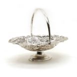 A late Victorian embossed silver fruit basket,