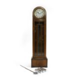 An Art Deco oak cased longcase clock by Enfield,