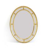 An oval giltwood marginal wall mirror,