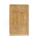 A Heals style limed oak wardrobe,