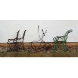 Two pairs of Victorian cast iron bench ends,