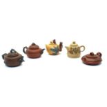 A collection of five Chinese Yixing zisha teapots,