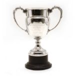 A silver two handled trophy cup,