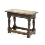 A 17th century style oak joined stool,