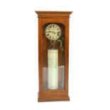 An early 20th century mahogany cased water clock,