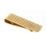 A gold money clip, by Tiffany & Co.,