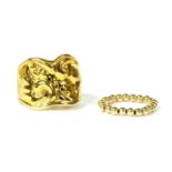 A 9ct gold tapered torque ring,