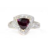 A 14ct gold garnet and diamond cluster ring,