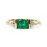 A 9ct gold emerald and diamond ring,