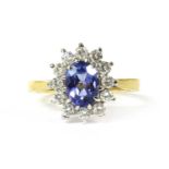 An 18ct gold tanzanite and diamond cluster ring,