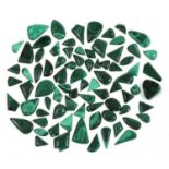 A large quantity of freeform malachite cabochons,