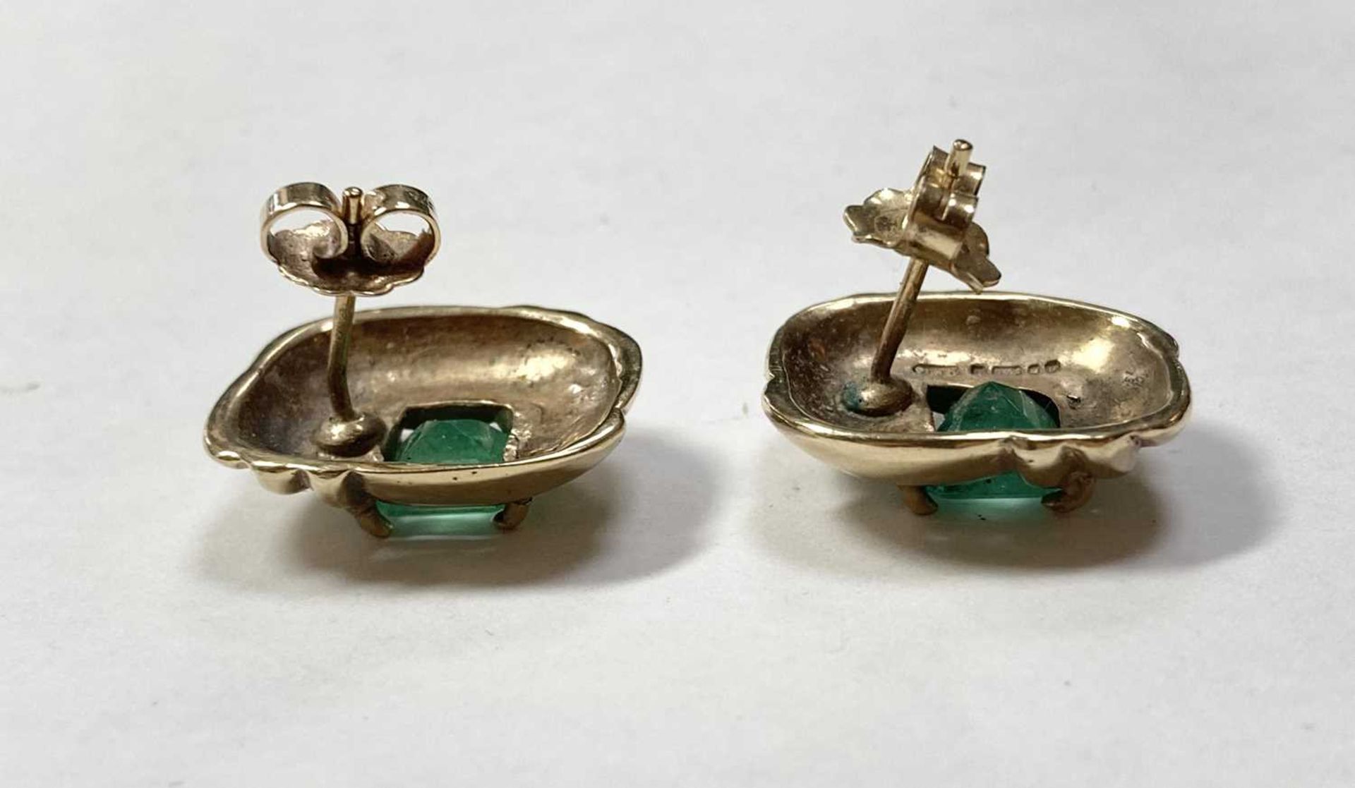 A pair of 9ct gold emerald stud earrings, - Image 2 of 3