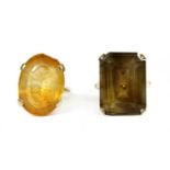 A gold single stone citrine ring,