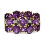 A 9ct gold three row amethyst and diamond ring,