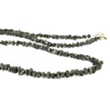 A rough black diamond crystal necklace,