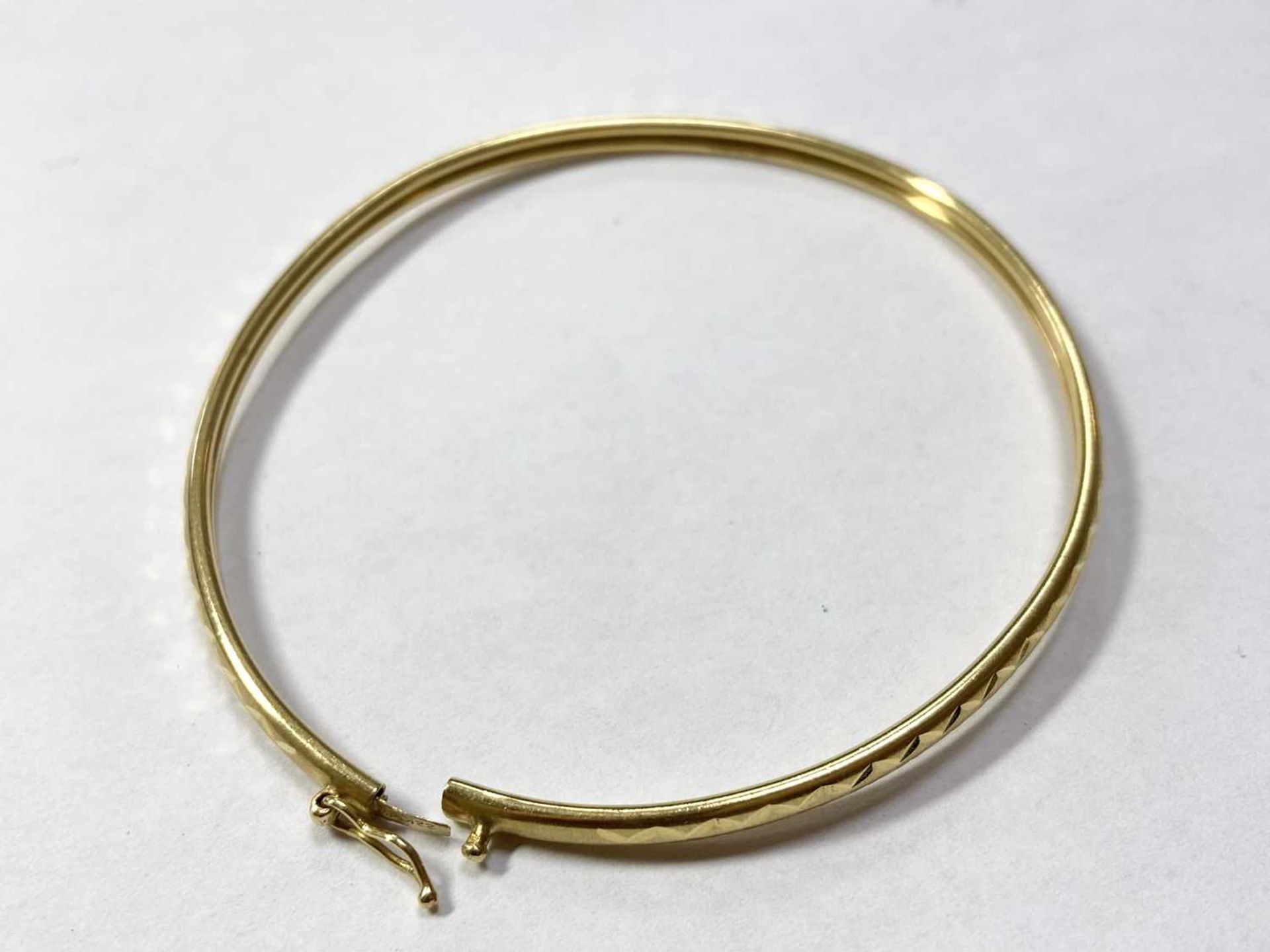 A 22ct gold oval bangle, - Image 3 of 3