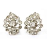 A pair of Continental silver and gold diamond set earrings,