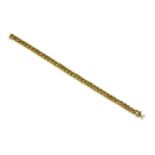 An 18ct gold curb link bracelet,