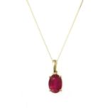 A gold single stone ruby pendant,