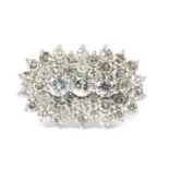 A white gold diamond cluster ring,