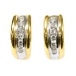 A pair of two colour gold diamond set 'J' hoop earrings,