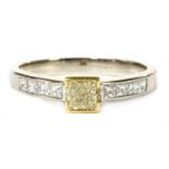 An 18ct white gold fancy yellow diamond ring,