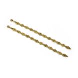 A pair of 18ct gold fancy hollow link bracelets,