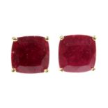 A pair of gold single stone ruby stud earrings,
