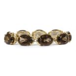 A 9ct gold smoky quartz bracelet,