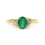 A 9ct gold emerald and diamond ring,