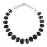 A silver sapphire necklace,