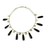 A silver onyx and citrine fringe necklace,