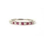 A 9ct white gold ruby and diamond half eternity ring,