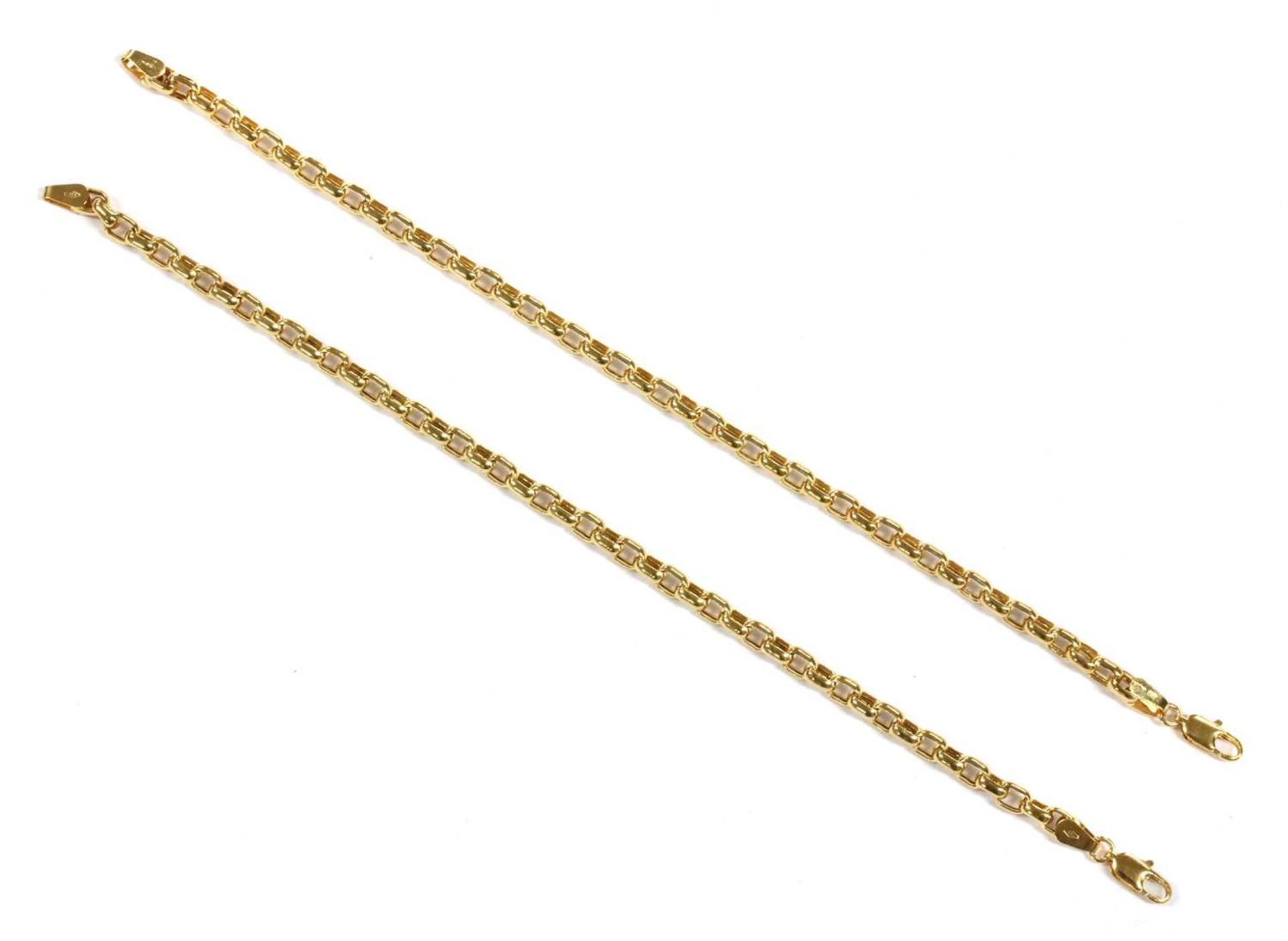 A pair of 9ct gold hollow paper link bracelets,