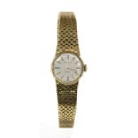 A ladies' 9ct gold Movado Zenith mechanical bracelet watch,